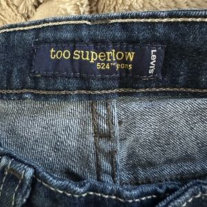 Levi too super low 524 dark denim
